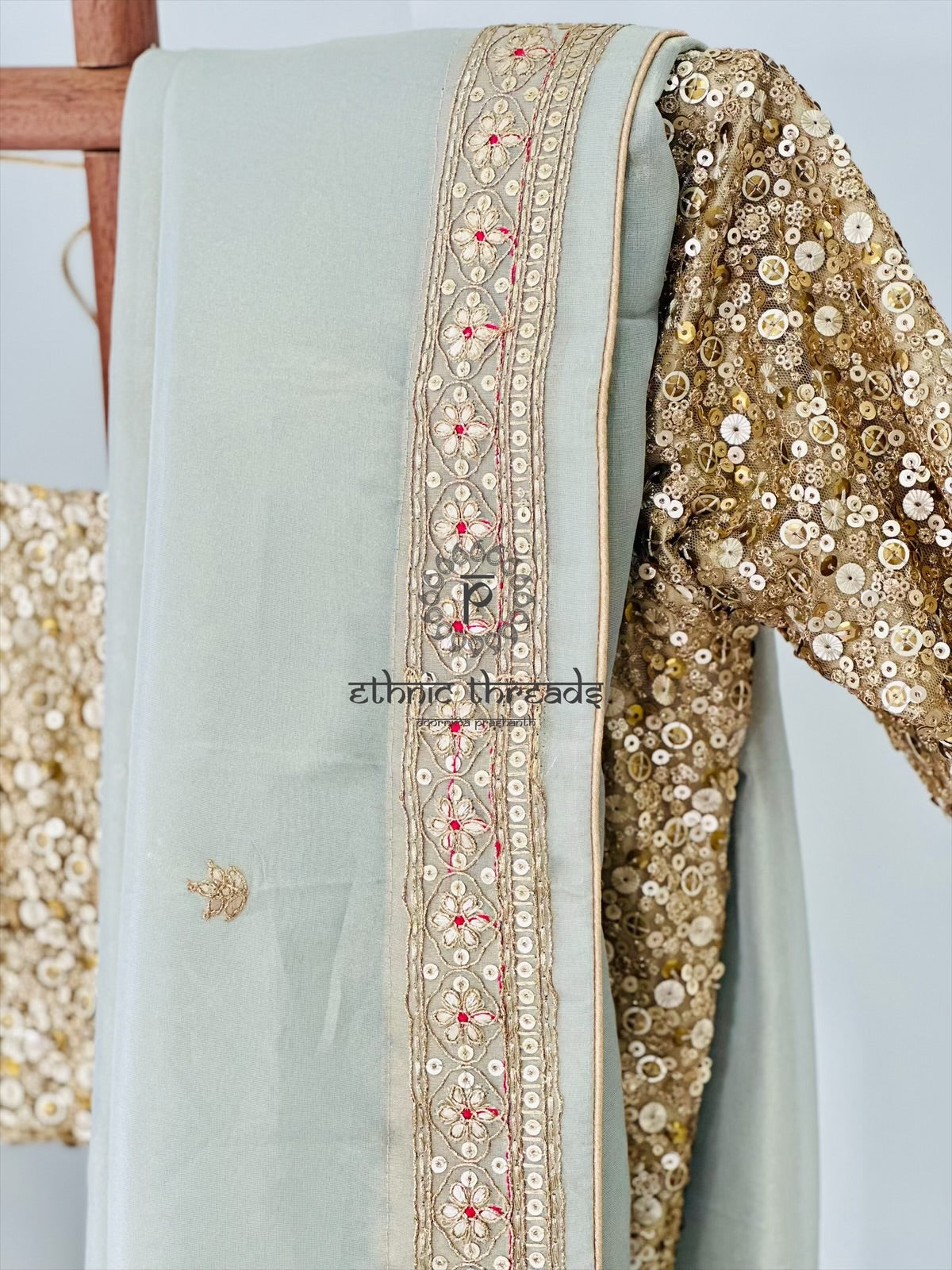Pastel Grey Glossy Soft Tissue Saree And Blouse