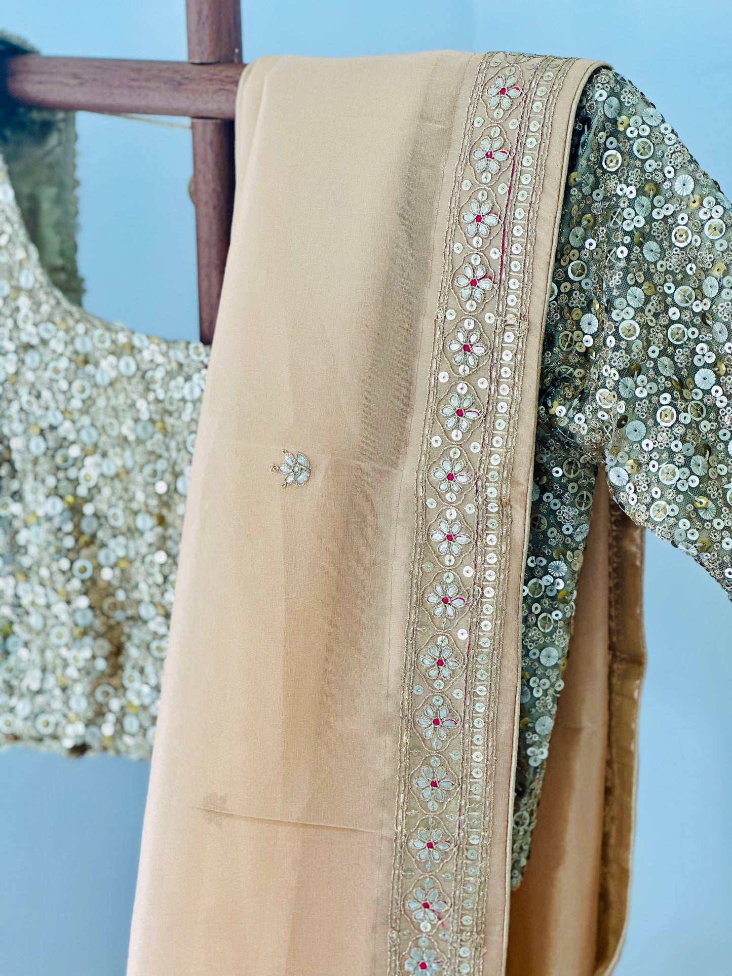 Light Peach Glossy Soft Tissue Saree And Blouse