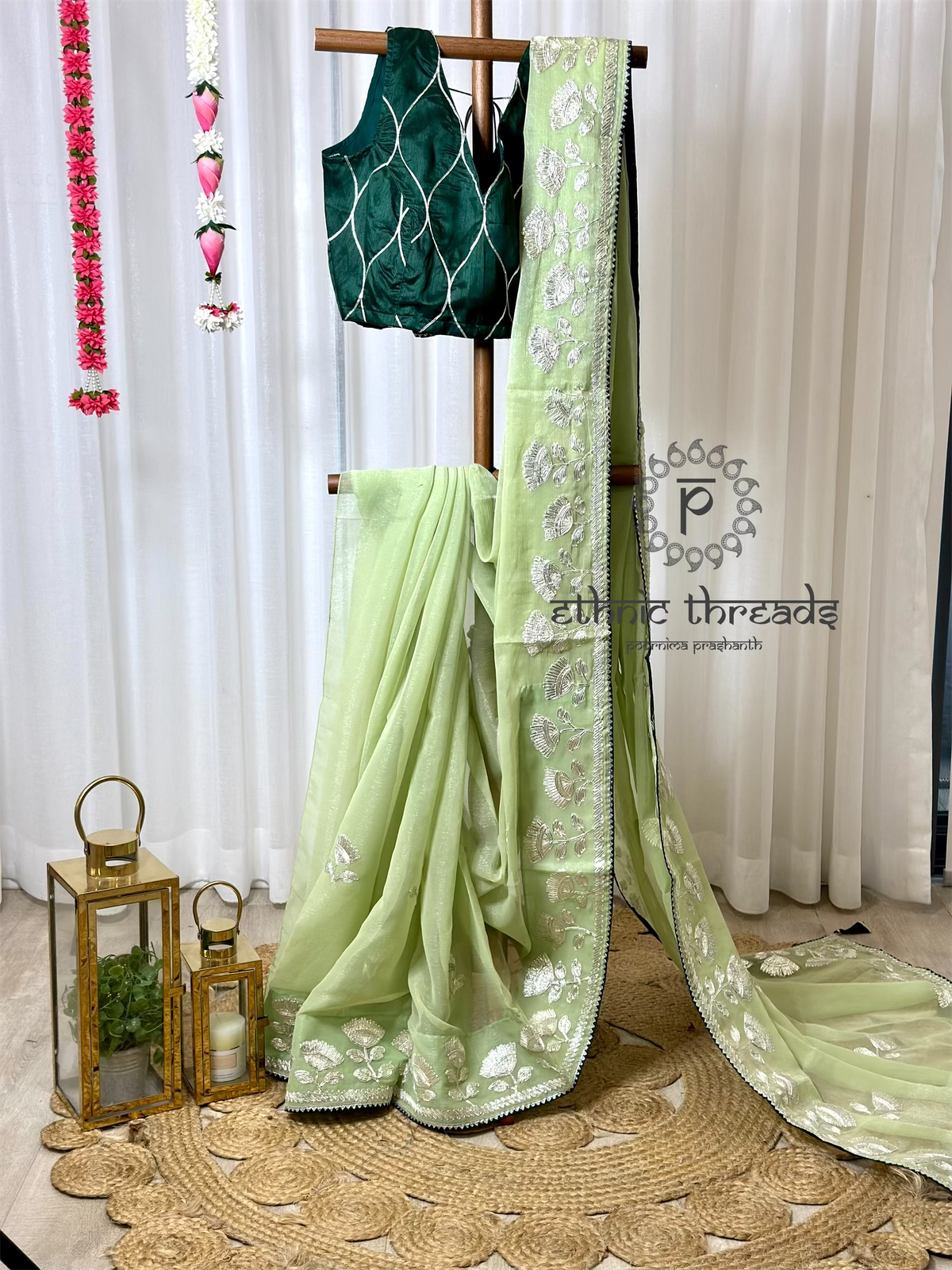 Pastel Green Embroidered Saree And Blouse