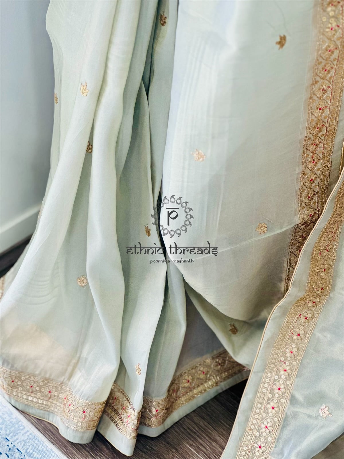 Pastel Grey Glossy Soft Tissue Saree And Blouse