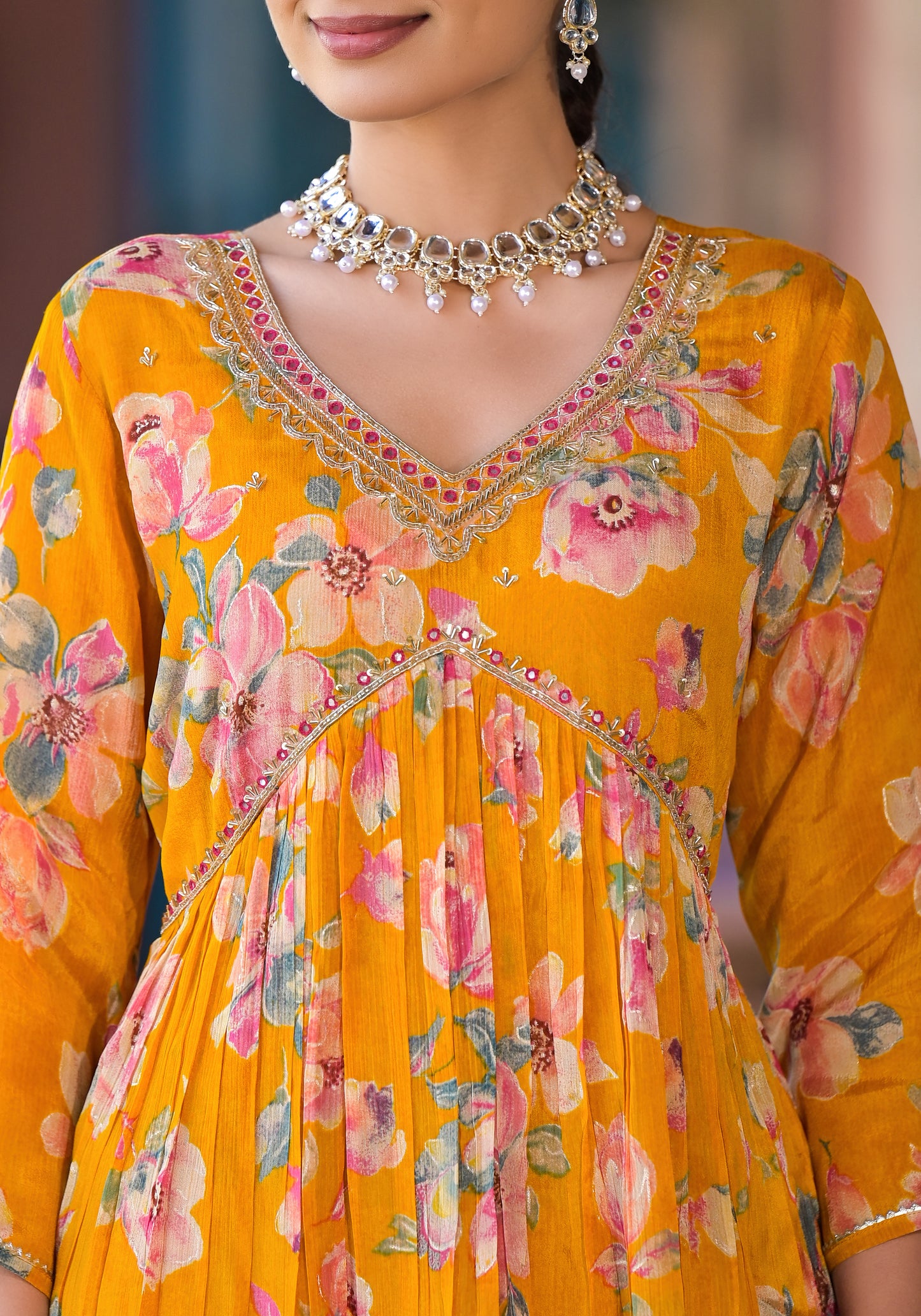 Orange Georgette Kurta Set with Embroidery, V-Neck, and Three-Quarter Sleeves