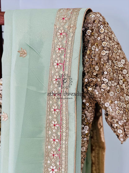 Pastel Green Glossy Soft Tissue  Saree And Blouse