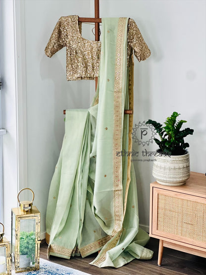Pastel Green Glossy Soft Tissue  Saree And Blouse