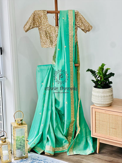 Mint Green Glossy Soft Tissue  Saree And Blouse