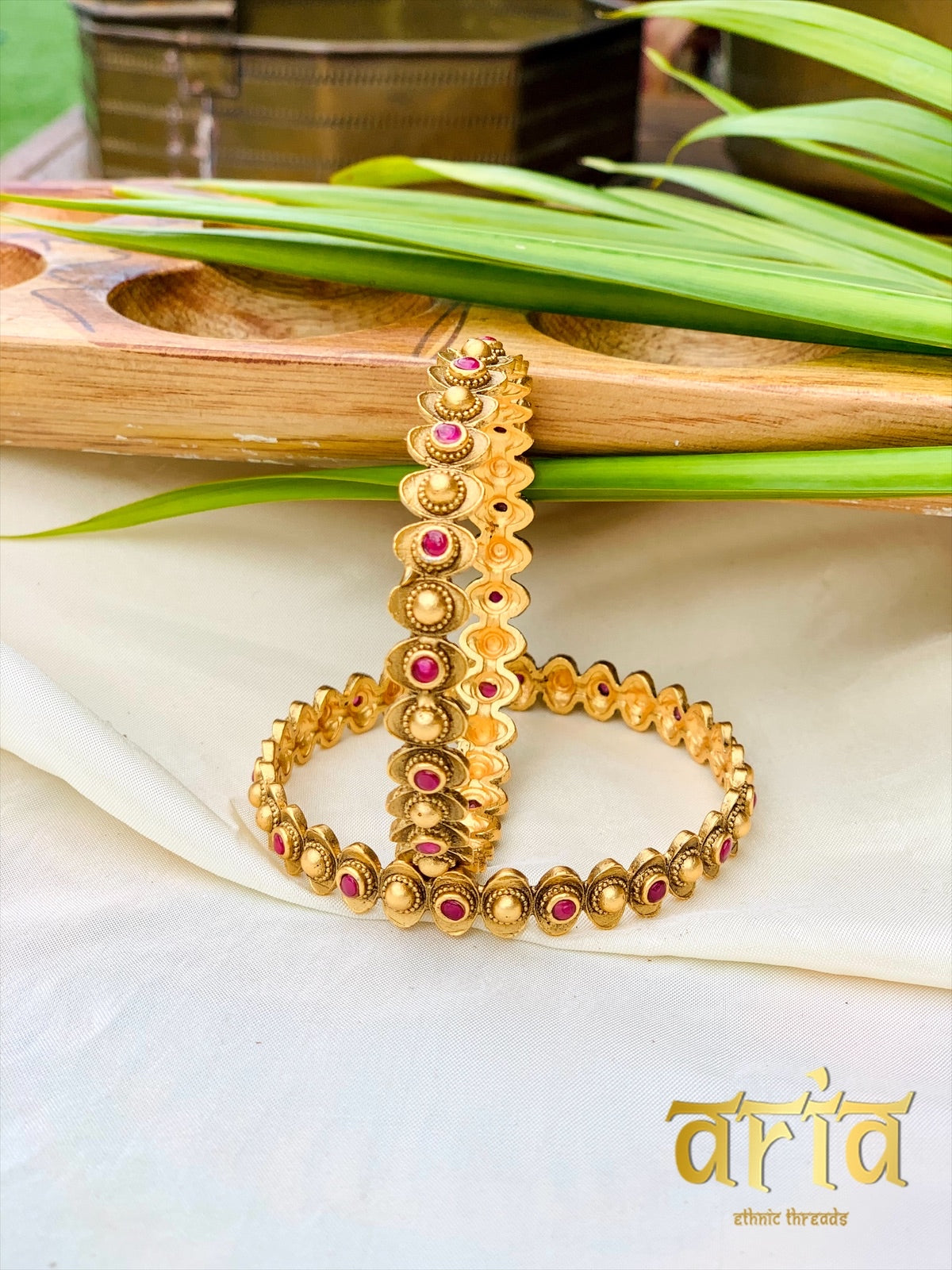 Golden Kada Bangles with AD Stones - (Set of 4)